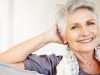Smiling senior woman relaxing at home
